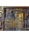 Black and gold lacquered Chinese box with central latch, ornate gilt details, and stylized birdwork on surface.