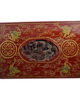Red lacquer rectangular box with gilt phoenix and vine designs, antique Chinese style, close-up view.
