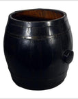 Brown varnished wood grain Chinese barrel with metal bands, open top, on white background.