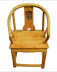 Brown elm wood antique Chinese horseshoe-back chair, 19th-century, with carved backrest figure, front view.