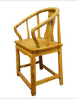 Brown wood antique Chinese horseshoe-back chair with curved backrest, rustic 19th-century design, on white background.