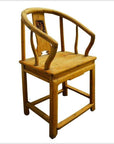 Dark wood Chinese horseshoe-back chair with curved backrest, sturdy legs, and carved back panel, front view.