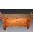 Dark wood Chinese Kang low cabinet with flat top, everted flanges, and decorative side panels on plain background.