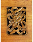 Brown walnut Chinese kitchen cabinet with hand-carved framework design, front view.