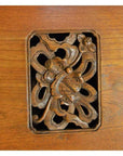Dark polished wood Chinese kitchen cabinet with hand-carved framework design, front view.