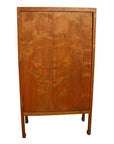 Brown wood antique Chinese kitchen cabinet with tall rectangular shape and hand carved framework on front.