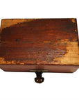 Black lacquered rectangular box with metal latch, visible age and surface scratches, antique style.