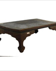 Brown wood antique Chinese low Kang coffee table with short curved legs and rectangular top on white background.