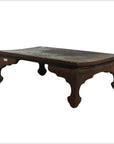 Dark wood antique Chinese low Kang coffee table with curved legs and rectangular top, on white background.
