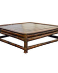 Brown wooden antique Chinese square ceremonial table with open sides, modern design, on white background.
