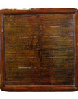 Brown wood and bamboo square ceremonial table with vintage finish, low height, shown indoors.