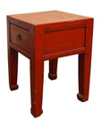 Red lacquered wood Chinese side table with one drawer and square horse-leg style legs, antique finish.