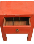 Red lacquer wood side table with horse-leg design, antique style, partially open drawer reveals wood interior.
