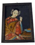 Colorful glass painting showing a woman in ornate traditional dress holding a flower, with sweets beside her.