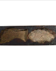 Brown wooden rectangular rice mold with carved fish and flower motifs, close-up, traditional Chinese design.