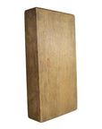 Brown wooden antique Chinese rice mold on plain white background, natural wood grain visible, close-up.