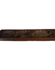 Close-up of rectangular antique Chinese rice mold made of wood with two carved circles, on plain white background.