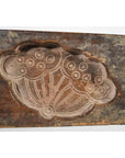 Brown antique Chinese wooden rice mold with Longevity symbol and sacred fungus motif, close-up view.