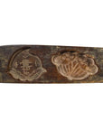 Brown antique Chinese wood rice mold with carved Longevity symbol and Sacred Fungus motif, close-up view.