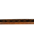 Brown wooden rectangular Chinese rice mold with eight evenly spaced round holes on top, close-up view.