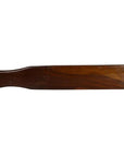 Close-up of antique Chinese rice mold with dark wood rectangular blade and curved handle on neutral background.