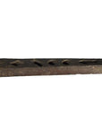 Weathered brown wood antique Chinese rice mold with coin, fish, and diamond cavities on white background.