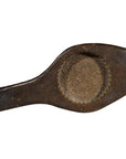 Brown wooden antique Chinese rice mold with handle, single round motif, and braided rim, close-up on white background.