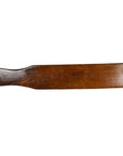 Brown antique wood Chinese rice mold with five rectangular character cavities, close-up on table.