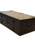 Small antique Chinese chest with metal accents, handles, and four drawers, wood finish, on a white background.