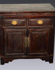 Small dark brown lacquered Chinese cabinet with brass handles, two drawers, and two doors, classic style.