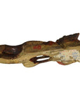 Brown wood antique Chinese temple carving with worn paint and faded labels, irregular abstract shape.