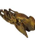 Antique wood Chinese temple carving with outstretched wings, diagonal view on white background.