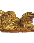 Pair of ornately carved wood Chinese temple dragon carvings, detailed close-up view, antique finish.