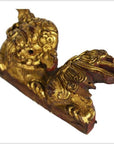 Gold-painted wood antique Chinese temple carvings pair with intricate dragon designs and detailed rectangular bases, close-up.