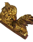 Gold-painted wood antique Chinese temple carvings pair with intricate dragon designs and detailed rectangular bases, close-up.