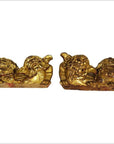 Antique Chinese dragon-shaped wood temple carvings, pair facing each other on a white background.