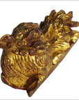 Ornate dragon-shaped antique Chinese temple carvings, wood, both facing upward, close-up pair view.