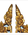Close-up of gold antique Chinese temple carvings, ornate floral details, displayed on a plain white background.