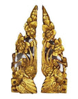 Close-up of white antique Chinese temple carvings with gold floral and bird motifs, framed by silver borders.