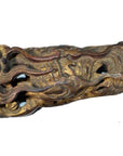 Close-up of antique wood Chinese temple carvings pair with intricate carved dragon motif.
