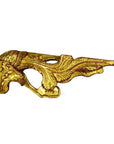 Gold carved wood Chinese temple figures with feathered wing-like design on white background, close-up.