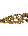Gold wood antique Chinese temple carvings with ornate floral and leaf patterns, side view on white background.