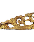 Gold wood antique Chinese temple carvings pair with ornate swirling leaf patterns and fine detailing, close-up view.
