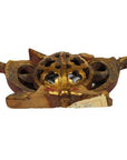 Gold and brown antique Chinese temple carvings with ornate floral patterns, front view.