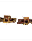 Gold and red wooden candle holders with ornate carvings, weathered finish, antique style, pair shown.