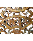 Brown wood carved Chinese temple wall decoration with fish, birds, and ornate 19th-century traditional patterns.