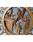 Brown wood handcarved 19th century Chinese temple panel with four robed figures in circular frame, close-up.