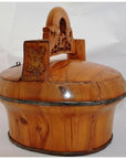 Brown wooden round box with lid and carved handle, antique Chinese wedding basket style, close-up.