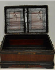 Brown wood and rattan box with red interior, open to show inside, textured exterior.