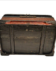 Black wood and rattan box with red accents, age wear, and textured top, front view.